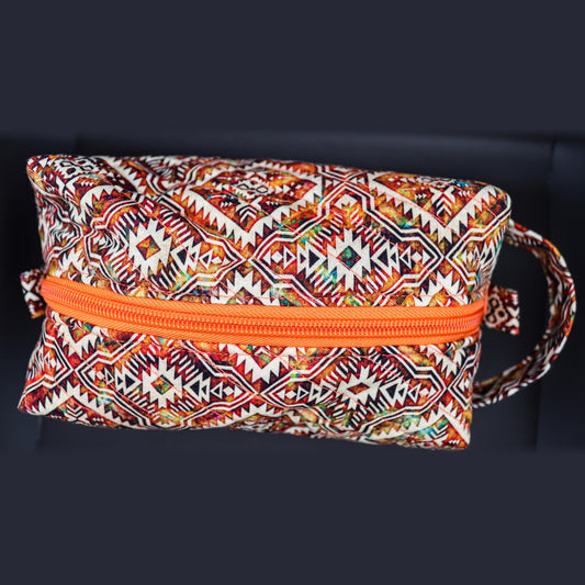 Rust and cream diamond print boxy bag from the side